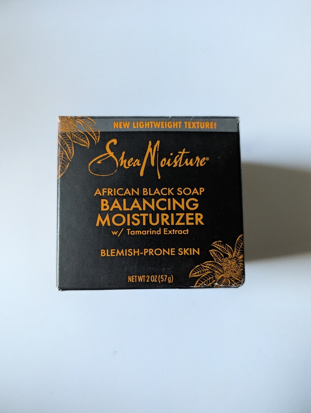 Shea Moisture Black and Orange Balancing Moisturizer
